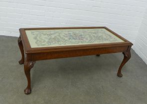 Walnut coffee table with glass top, raised on shell carved cabriole legs, 110 x 45 x 52cm.