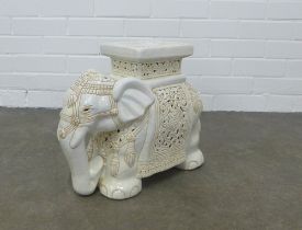 A white glazed elephant pottery stool, 43 x 35cm.