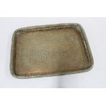 Arabian or Middle Eastern copper tray with stylised pattern and rectangular pierced rim, 54 x 39cm