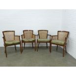 Set of four mahogany armchairs with canework sides and back, tapestry cushion seats, 60 x 74 x 45cm.