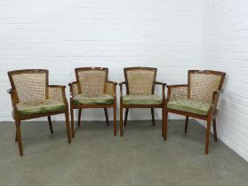 Set of four mahogany armchairs with canework sides and back, tapestry cushion seats, 60 x 74 x 45cm.
