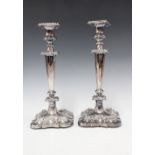 A pair of silver plate on copper candlesticks, (2)