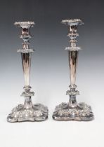 A pair of silver plate on copper candlesticks, (2)