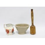 Stoneware jelly mould, 11cm, together with a wooden kitchen mallet and a Staffordshire mask head jug