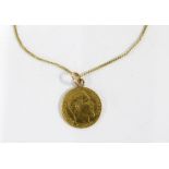 A gold Five Francs coin on a 9ct gold chain necklace