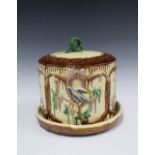 Majolica cheese dish and cover with birds and blossom pattern, 25cm high