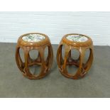 Pair of chinoiserie barrel shaped round stools/tables, with glazed tops, 42 x 45cm. (2)