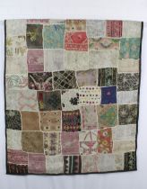 Patchwork quilt, with some crewelwork and embroidered panels, and mirror applique, 155 x 100cm