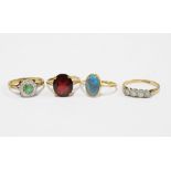 A group of four 9ct gold gemset & paste rings (4)