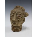 Krinjabo Memorial Head, Cote D'Ivoire, a terracotta head with ringed neck and facial