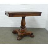 William IV rosewood tea table, fold over swivel top on a baluster column with platform base and leaf