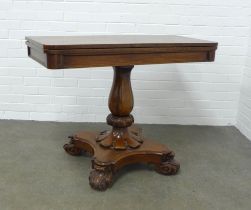 William IV rosewood tea table, fold over swivel top on a baluster column with platform base and leaf