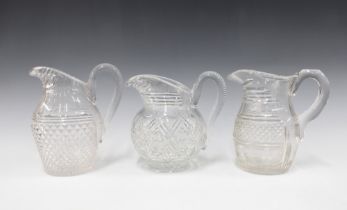 Three 19th century glass water jugs (3) 19cm.
