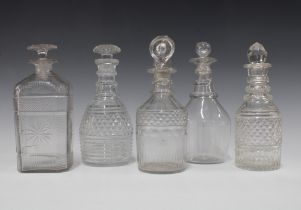 Five 19th century glass decanters with stoppers (5) 22cm.