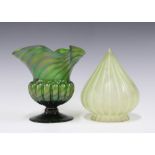 An early 20th century iridescent green glass vase together with a small glass shade (2) 15 x 16cm.
