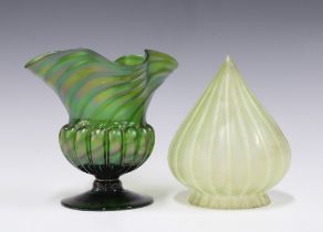 An early 20th century iridescent green glass vase together with a small glass shade (2) 15 x 16cm.