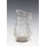 An antique French glass water / ale jug with double ring neck and engraved wheatsheaf pattern, small