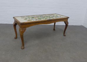 Mahogany coffee table with tapestry top, 109 x 45 x 44cm.