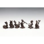 An African bronze patinated metal band, with six musicians, tallest 9cm (6)