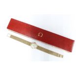 Ladies 9ct gold Omega wristwatch, on a 9ct gold bracelet strap, with original box