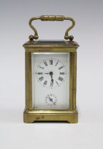 Miniature brass and glass cased alarm carriage clock, with key 9.5cm including handle