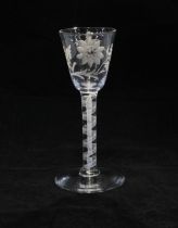 Mid 18th century Jacobite glass with enamel spiral twist stem, the bowl engraved with sunflower