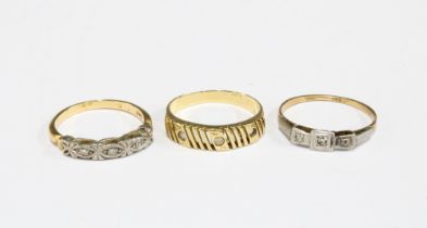 Two 18ct gold dress rings and a yellow metal ring (3)