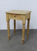 Light pine table, single frieze drawer and turned legs, 52 x 74 x 40cm.