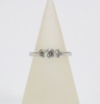 White gold three stone diamond ring