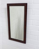 Faux rosewood wall mirror, 33 x 60cm.