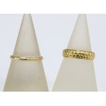 18ct gold wedding band, London 1971 & an unmarked gold wedding band of twisted design (2)