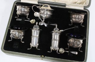 George V silver seven piece cruet set in original fitted case, Levi & Salaman, Birmingham 1918