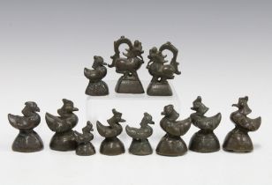 Collection of small bronze birds, largest 7cm, together with a pair of bronze animals (11)