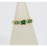 18ct gold emerald and diamond ring, stamped 18k