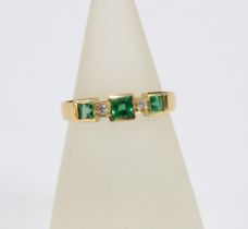 18ct gold emerald and diamond ring, stamped 18k