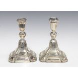 A pair of German silver candlesticks, stamped 835, 18cm high (2)