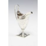 George III silver cream jug, overstruck marks likely for George Gray, London 1791, of helmet form
