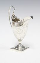 George III silver cream jug, overstruck marks likely for George Gray, London 1791, of helmet form