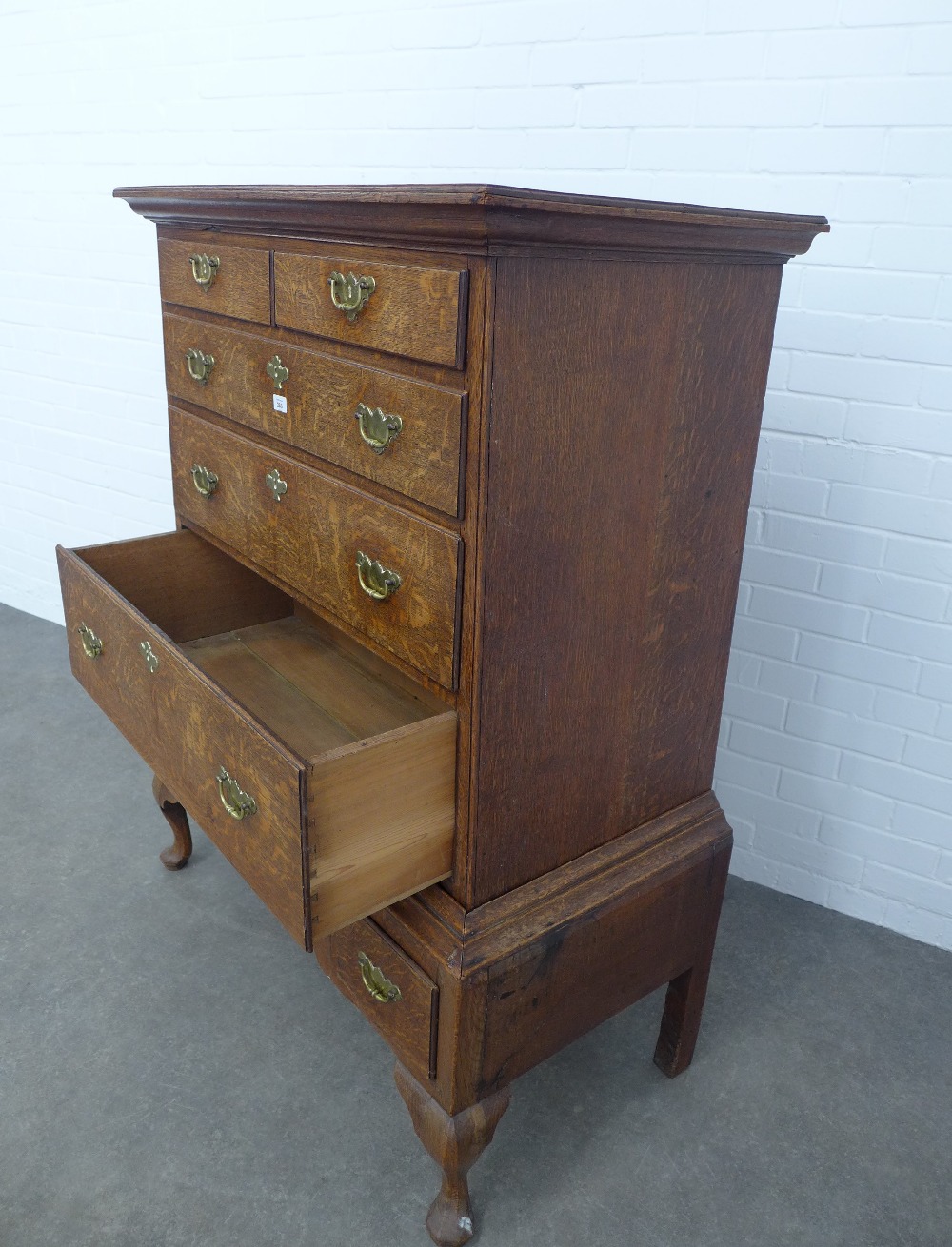 An oak chest on stand, the top with two short and three graduating long drawers, the base with three - Image 4 of 4