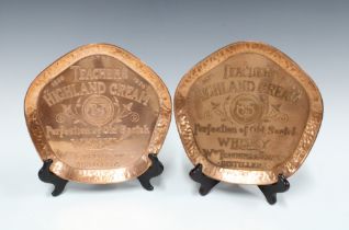 Pair of Teacher's Highland Cream whisky copper trays, 22cm (2)