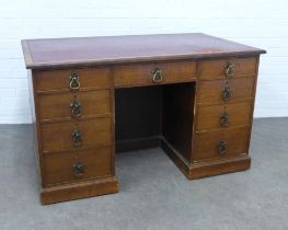 An early 20th century oak desk, 129 x 76 x 78cm.
