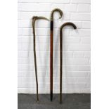 Brass elephant handled walking stick, 94cm, together with a horn handled walking stick, 87cm, and