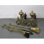 Brass and iron fire dogs, 34cm long and a brass fireside companion set (6)