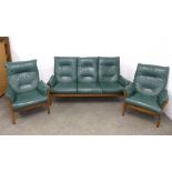 Ercol Golden Dawn green leather and elm three piece suite, 189 x 99 x 57cm. (3)