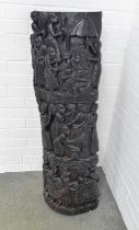 African ebonised totem style panel, profusely carved with figures and constructed with dense heavy