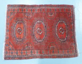 Eastern rug, red field with three guls, 120 x 90cm.