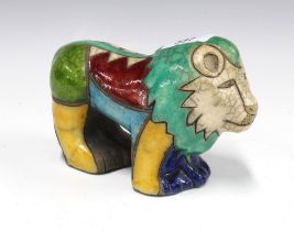 Art pottery lion in multi coloured crackle glaze, 19cm long