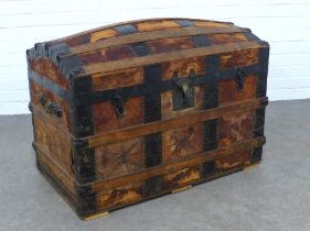 Vintage leather and metal bound trunk, dome topped with side handles, 90 x 64 x 53cm.