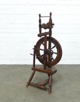 Spinning wheel, of small proportions, 86 x 40 x 34cm.