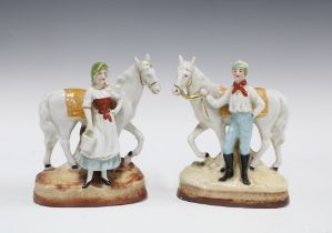 A pair of German porcelain Fairing type figures (2) 13 x 12cm.